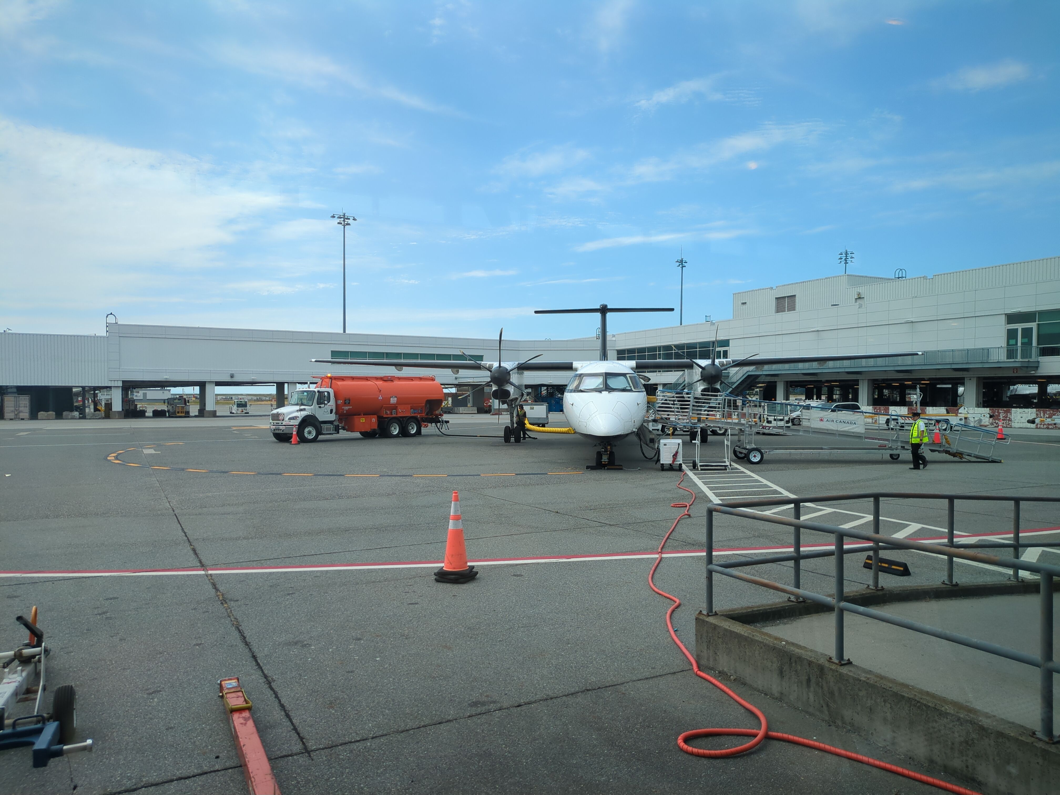 Boarding a propeller aeroplane in Vancouver.